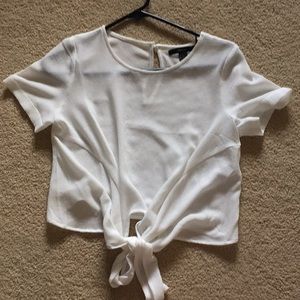 White blouse with front tie.